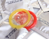 Condom packets, with two opened.
